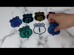 Изготовленные на заказ равномерные одежды заплат латают утюг дизайна на заплатах вышивки