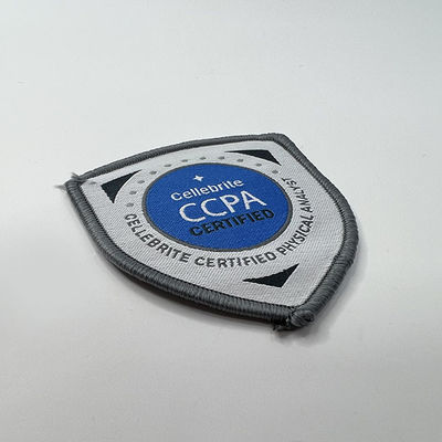 Утюг границы Брауна Merrow логотипа CCPA на заплате заплат вышивки водоустойчивой изготовленной на заказ сплетенной
